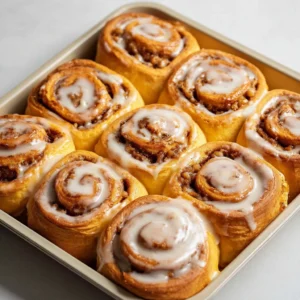 Cinnamon Rolls Stuffed with Pumpkin Cheesecake | Fall Dessert